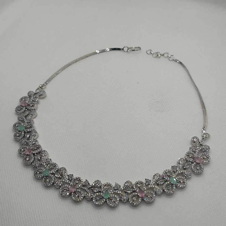 Adrika Silver Plated AD Necklace with Jhumka Earrings & Tikka