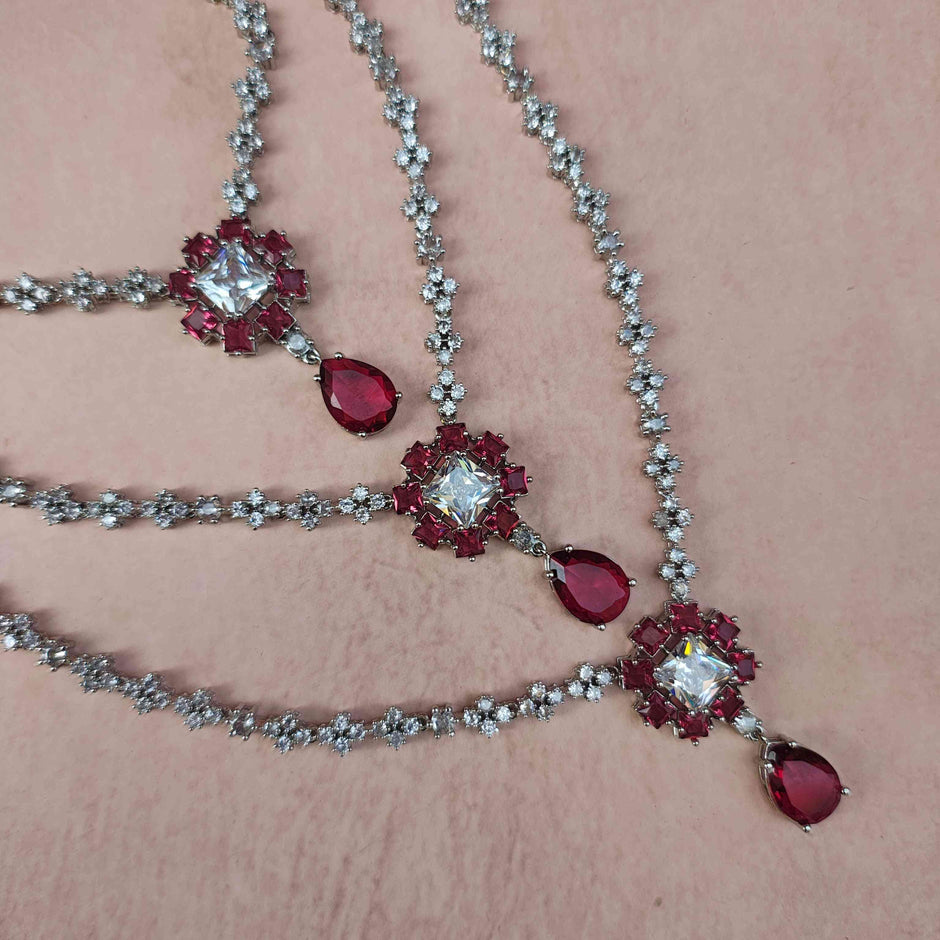 NEETA MULTI LAYERED RUBY RED AD NECKLACE SET