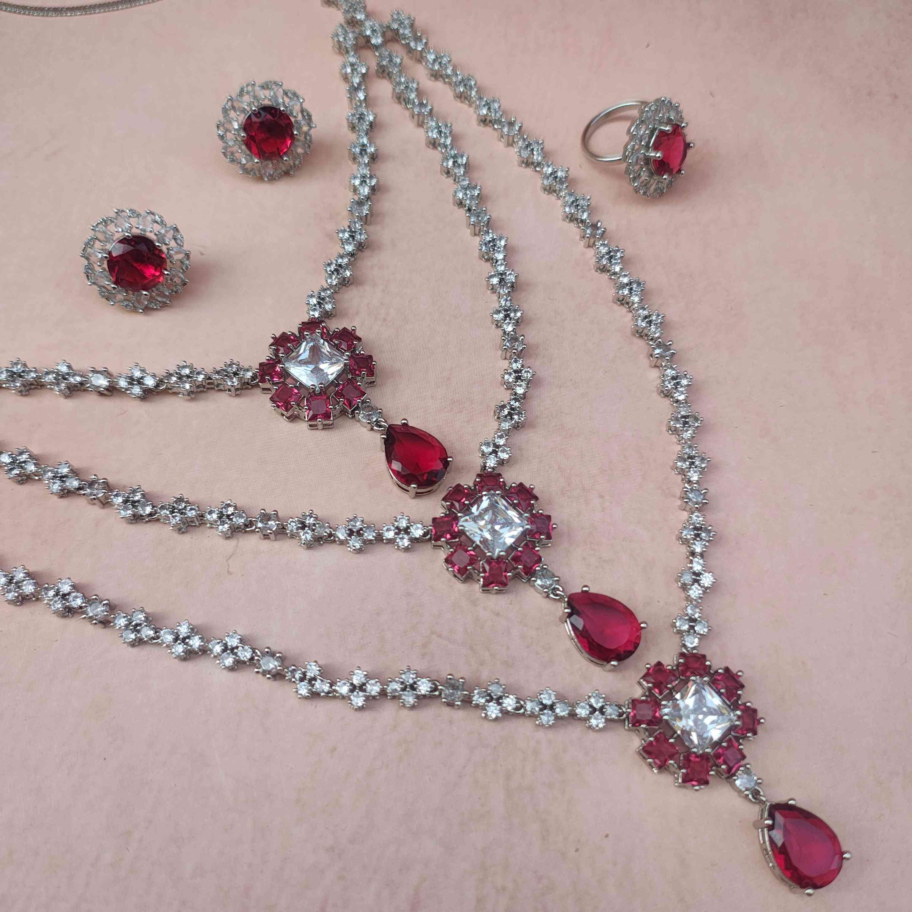 NEETA MULTI LAYERED RUBY RED AD NECKLACE SET