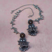 Nupur Silver Oxidized Jhumka Earrings with Ear Chain