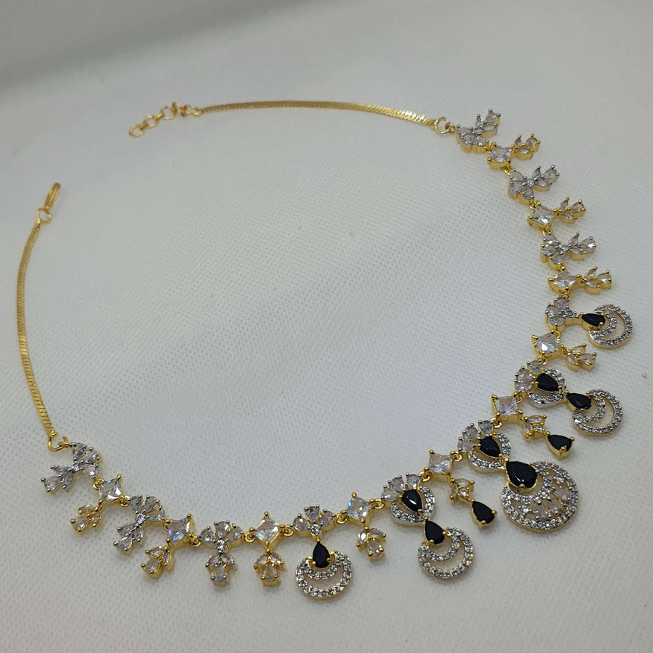 OJASVI GOLD PLATED AD NECKLACE WITH DROP EARRINGS
