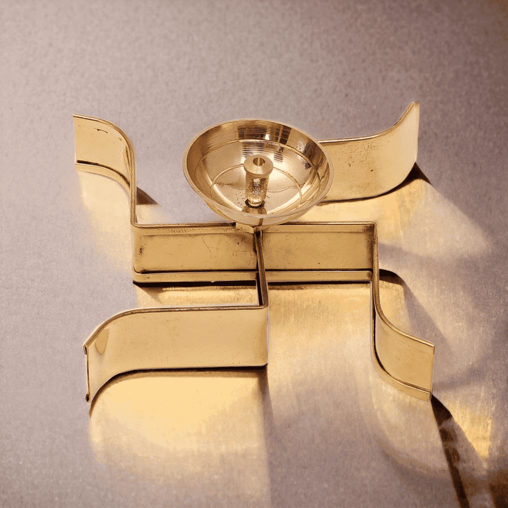 Sacred Swastik Shaped Brass Diya - The Sundook